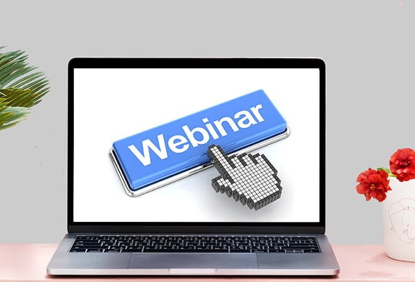 En datamaskin med teksten "Webinar" på skjermen. Illustrasjonsbilde.