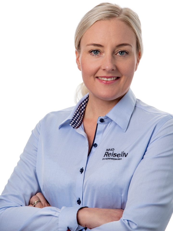 Portrettbilde av en smilende kvinne. Foto.